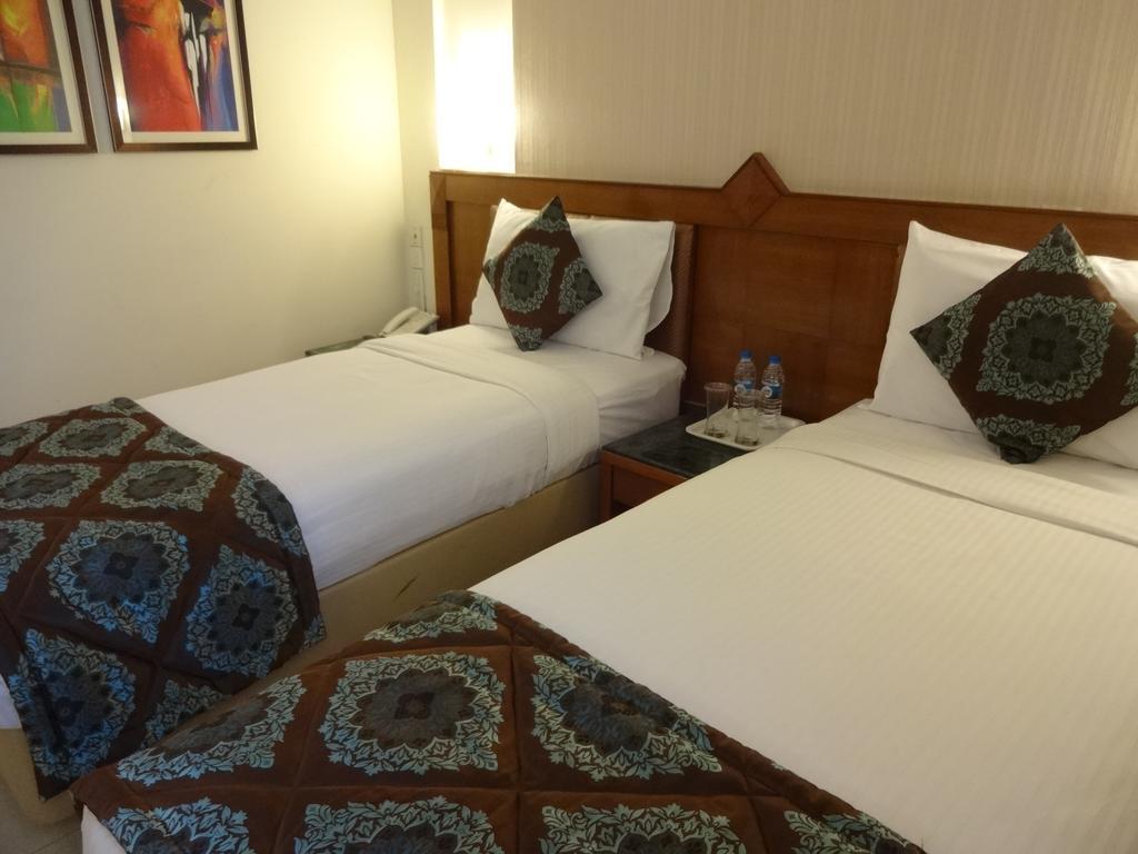 J P Cordial Hotel Bangalore Exterior photo
